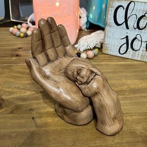 Hand carved piece
with child Hand carved piece 
1 chip on thumb